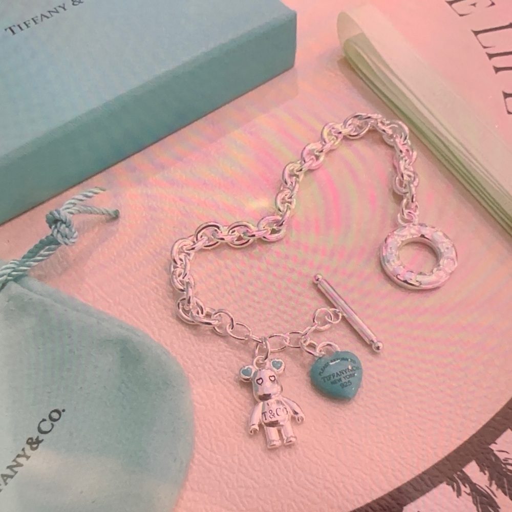 Tiffany & Co. Silver Charm Bracelet with Blue Heart and Bear
